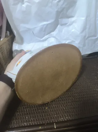 Adorno pareja cerámica sentado en barca.