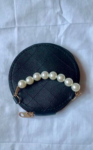 Monedero redondo negro