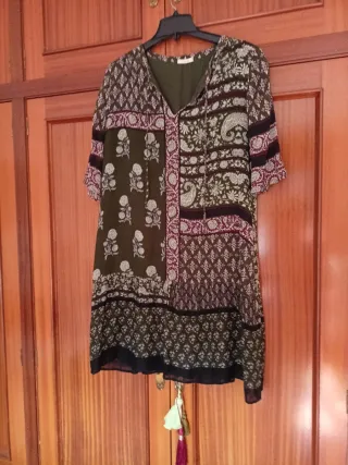 Lote 2 vestidos:  1 mono