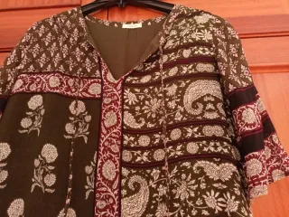 Lote 2 vestidos:  1 mono