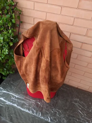 Gilet con frange in camoscio