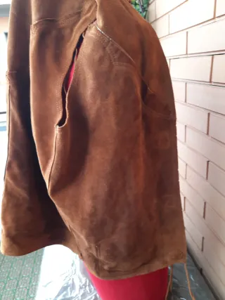 Gilet con frange in camoscio