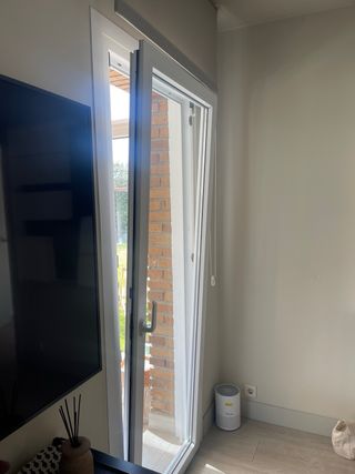 Puerta oscilobatiente