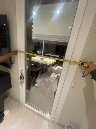 Puerta oscilobatiente