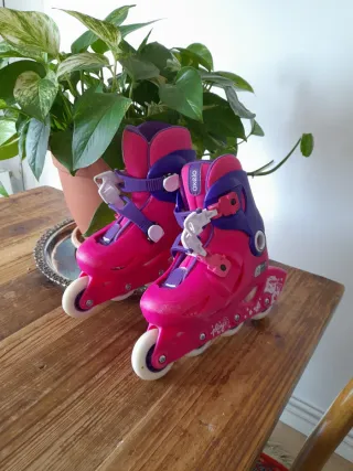 Patines Oxelo niña rosas y morados