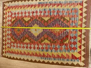 Prezioso kilim multicolore.