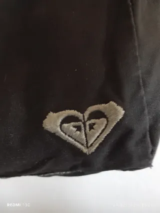 Bolso Roxi negro, con monedero.