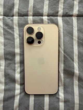 iPhone 14 Pro de 128 GB en color dorado