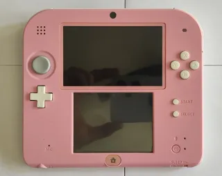 Nintendo 2DS Rosa y Blanca + 3 juegos fisicos