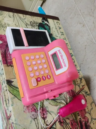 Caja registradora de juguete rosa