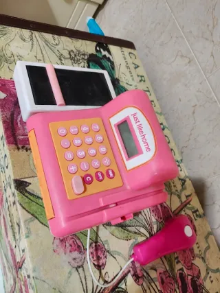 Caja registradora de juguete rosa