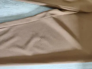 Pantaloni con catena