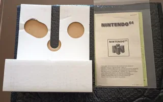 Mando Nintendo 64 en su caja Original.