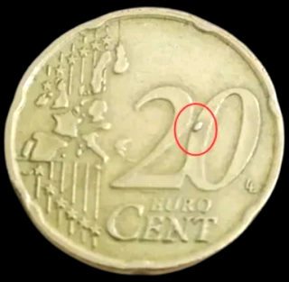 2004 DEFECTO MONEDA 0,20€ EXCESO DE METAL