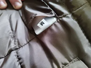 Chamarra café con gorro de pelo