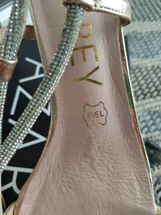 Sandalias doradas piel