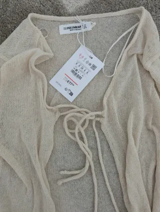 Cárdigan beige con lazada