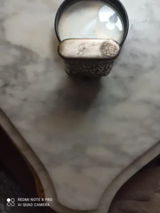 Mechero antiguo con grabado