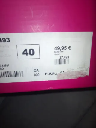 Botines negros con cremallera dorada