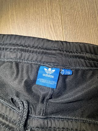 Pantalones Adidas negros con rayas
