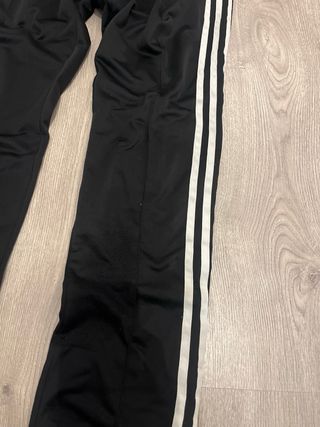 Pantalones Adidas negros con rayas