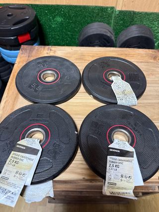Lote 4 discos de caucho de Decathlon 2.5 kg