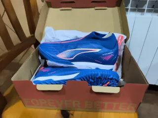 Botas de fútbol niño Puma multitacos azules