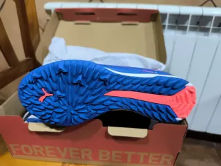 Botas de fútbol niño Puma multitacos azules