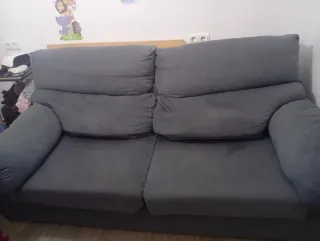 Sofá de tela gris los desperfectos no se notan