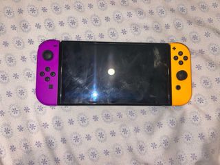 Nintendo Switch OLED Morado y Naranja