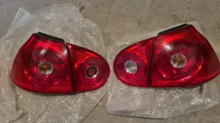 Pilotos traseros Golf V. Originales.