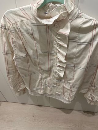 Blusa de rayas con volantes
