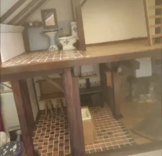 Casa de muñecas rústica de madera