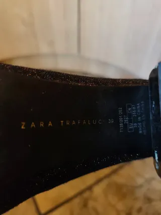 Botín brillante tacón negro