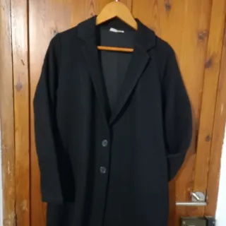 Conjunto vestido y abrigo negro