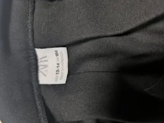 Falda negra simple, talla 13-14 años