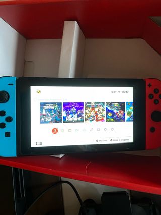 Nintendo Switch con juego Ori y accesorios