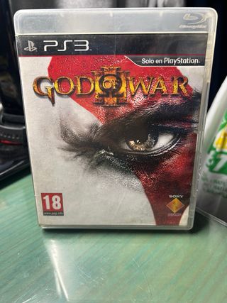 PlayStation 3 con mando y God of War
