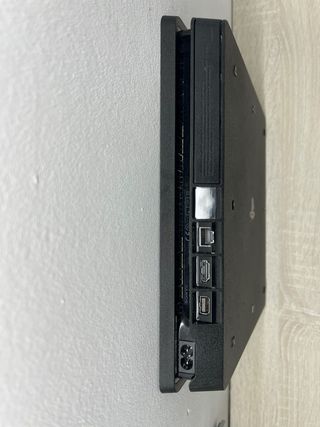 PS4 Slim 1TB + 9 Juegos + 2 Mandos