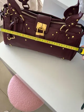 Borsa vintage bordeaux con dettagli oro
