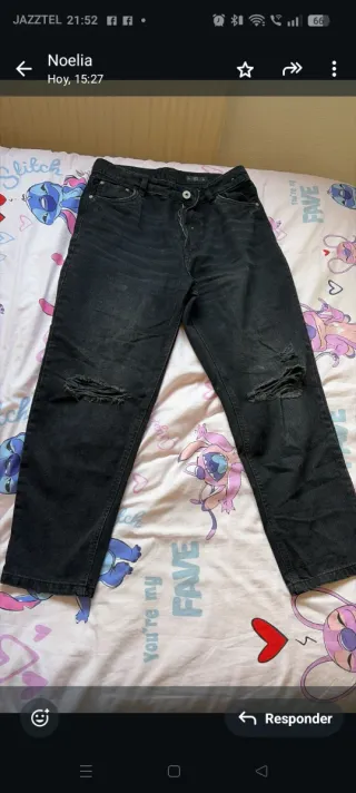 Pantalones vaqueros negros rotos