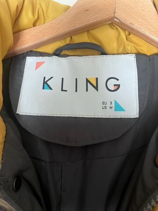 Plumífero Kling amarillo y gris