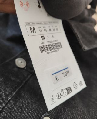 Chaqueta Zara con capucha gris/negra. Talla M