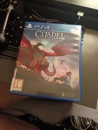 PS4 (PlayStation 4) Negra + Mando y Juegos