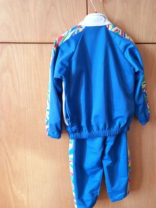 Tuta sportiva bimbo American Rap 6/7 anni