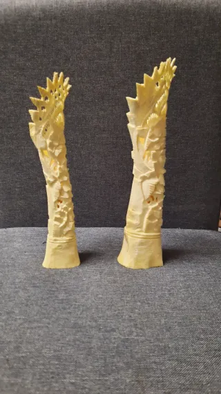 Coppia sculture osso intagliate a mano