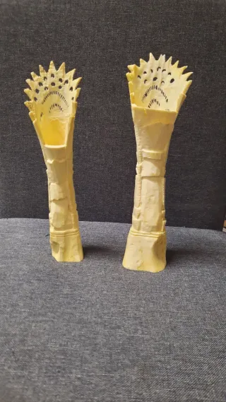 Coppia sculture osso intagliate a mano