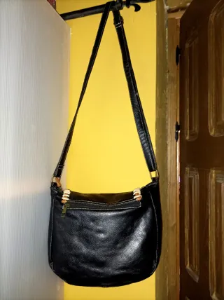 Bolso estilo marroquinería negro y marrón