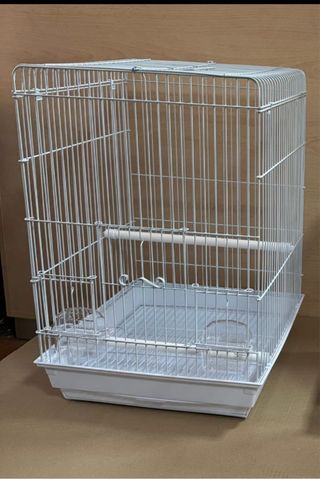 Jaula blanca para pájaros
