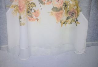 Sudadera floral gris y blanca Talla L